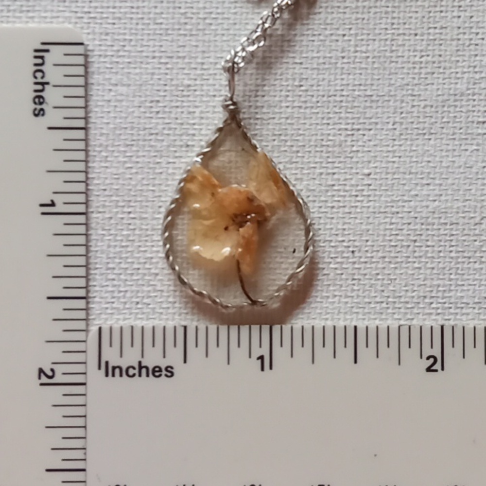 Floral necklace, amulet